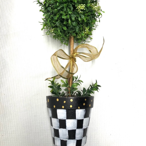 Topiary in painted pot